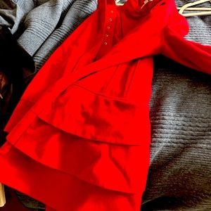 Super cute red wool coat.